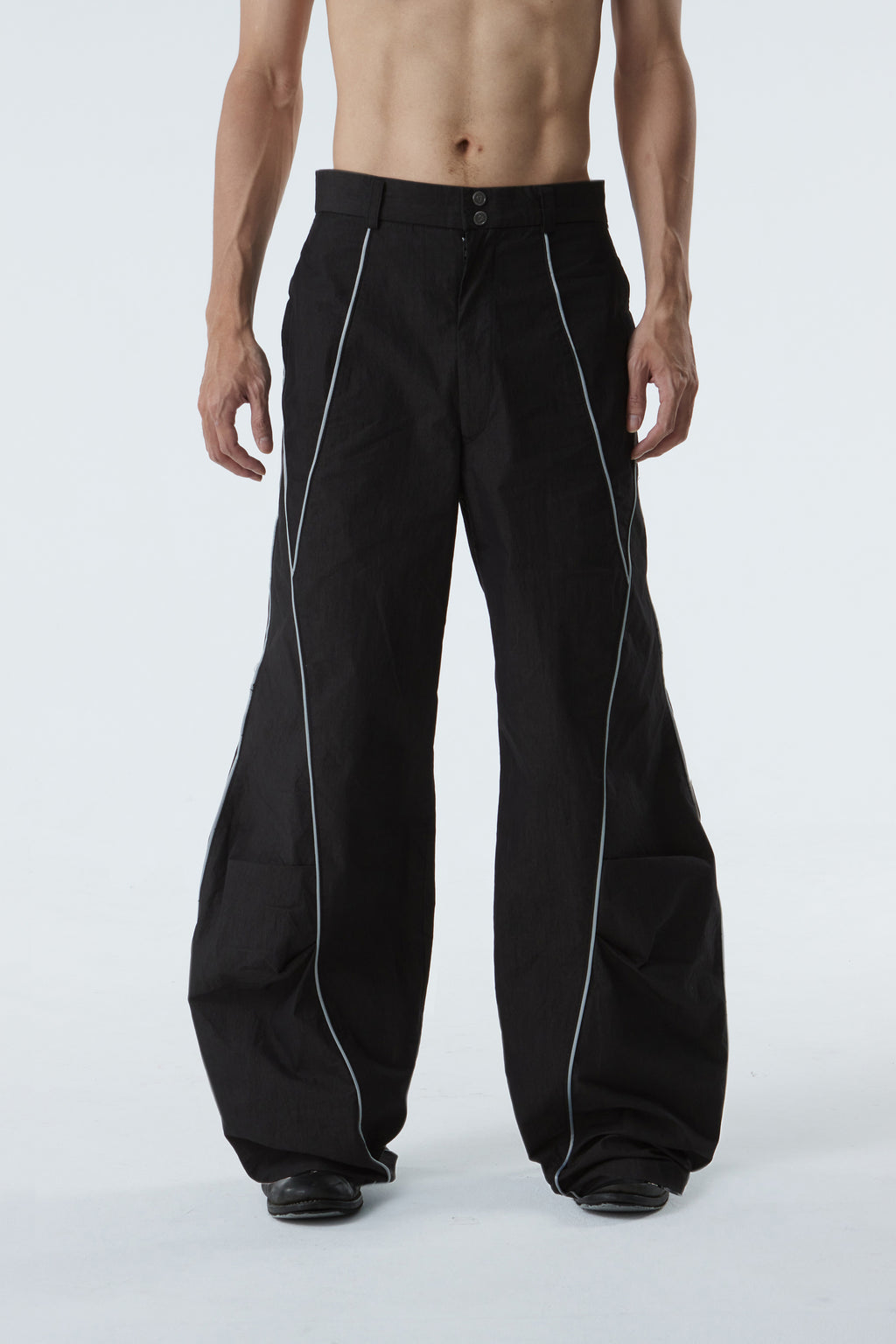 CURVED-WIDE LEG PANTS