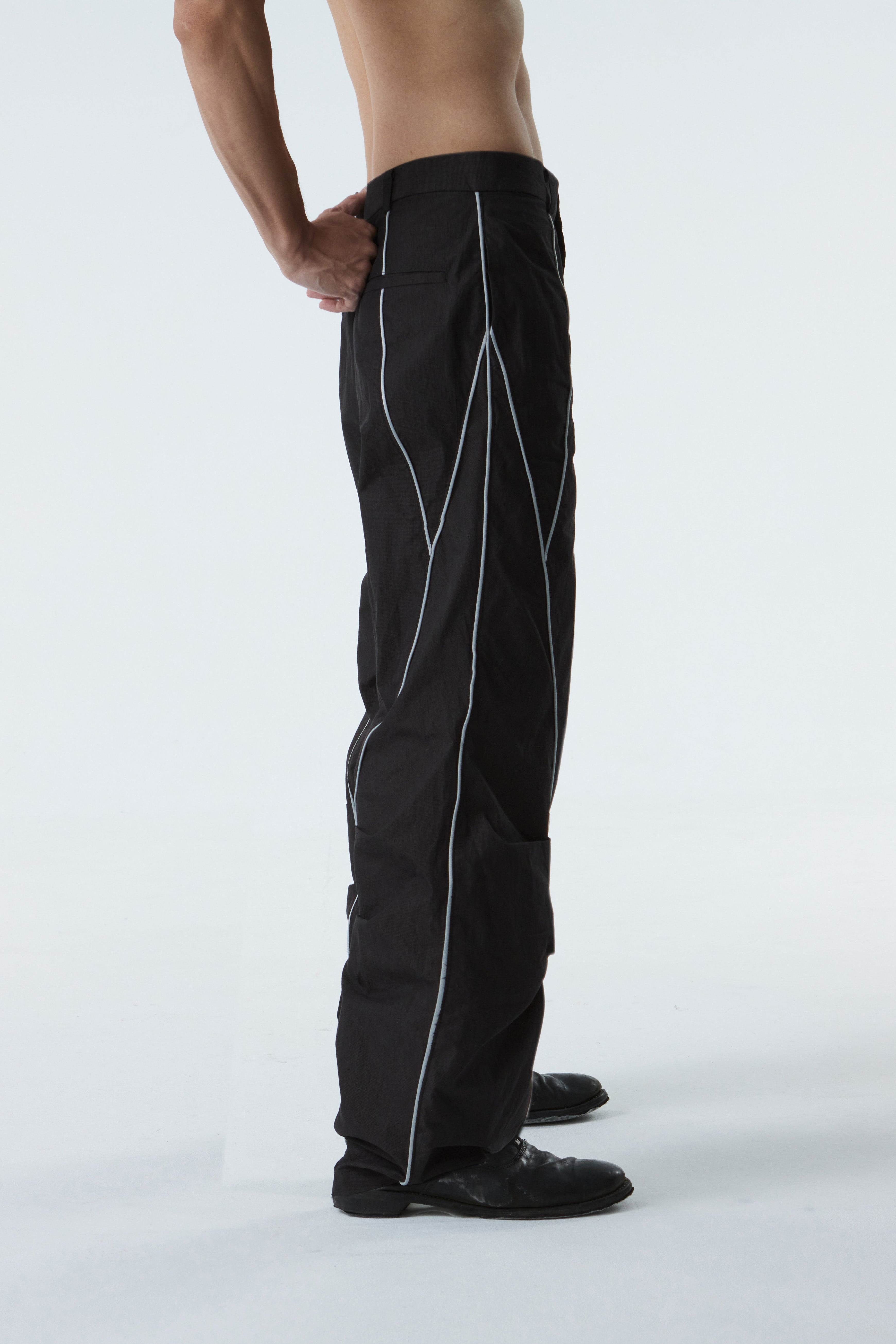 CURVED-WIDE LEG PANTS