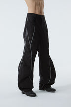 CURVED-WIDE LEG PANTS